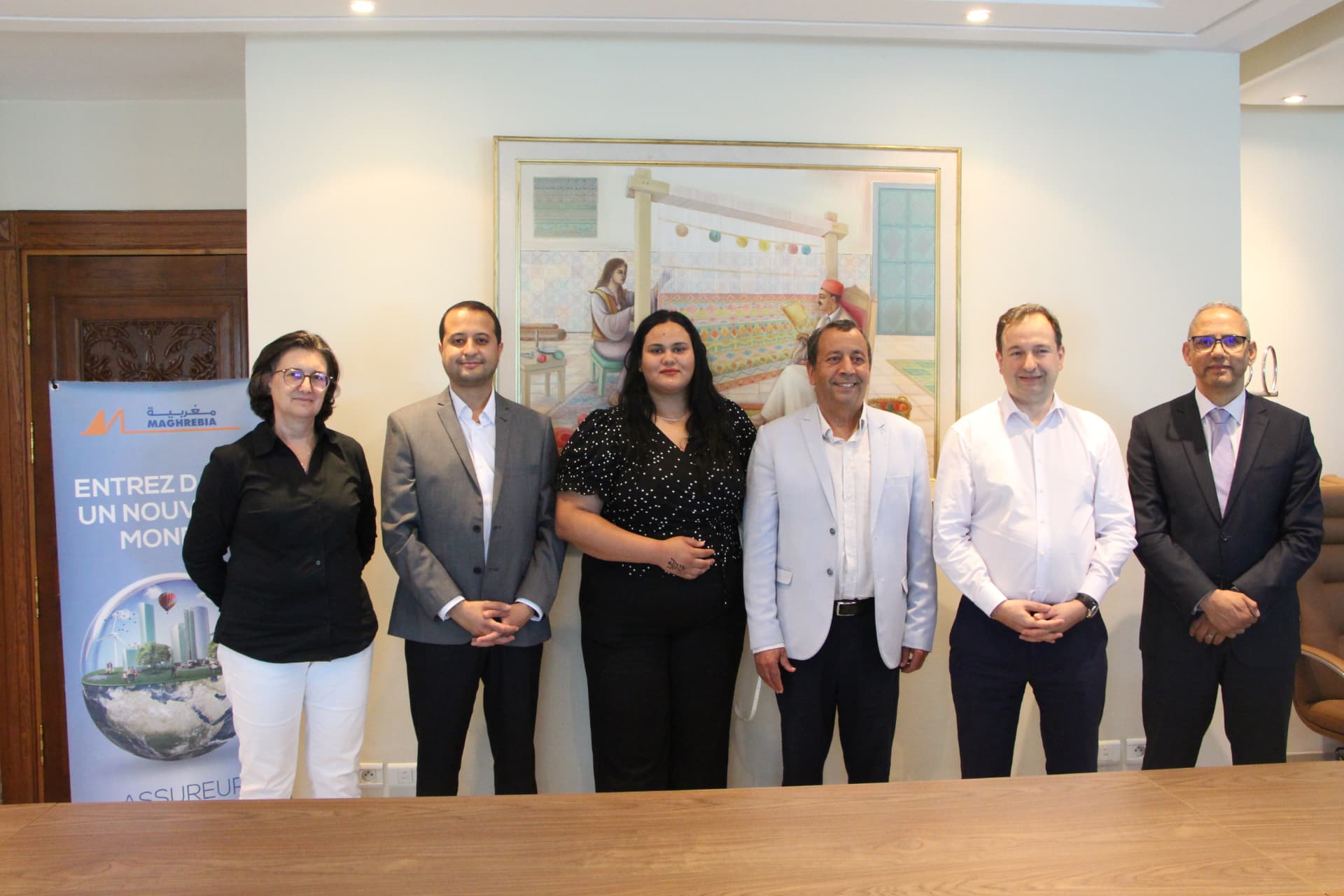 Curatis Foundation team with Assurance El Magharibia representatives marking the partnership